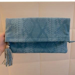 Bloomingdale’s turquoise clutch bag